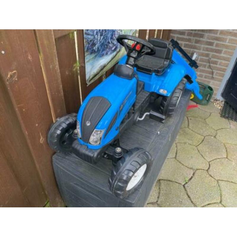 Tractor jongen met aanhanger