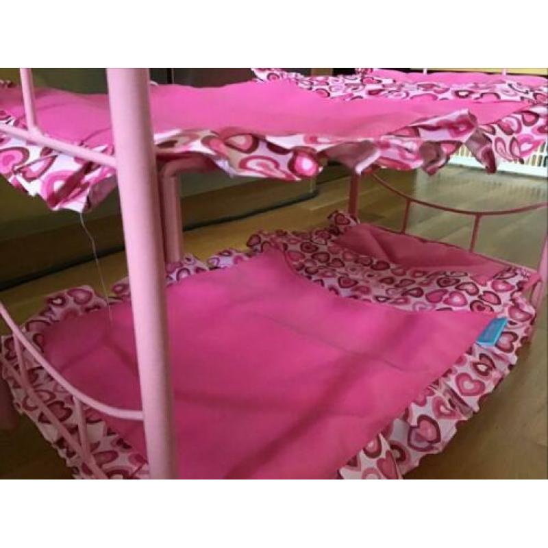 Roze stapelbed voor poppen